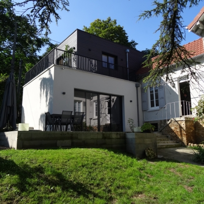 EXTENSION D’UNE MAISON INDIVIDUELLE A USAGE DE BUREAUX ET D’HABITATION